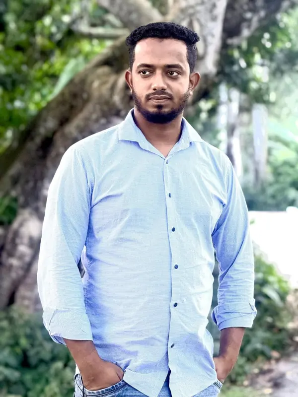 Portrait of Md. Kajmir Al Sabbir in a light blue shirt